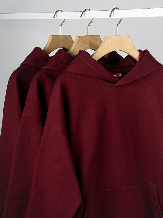 26 Solid color fleece-lined hooded sweatshirt