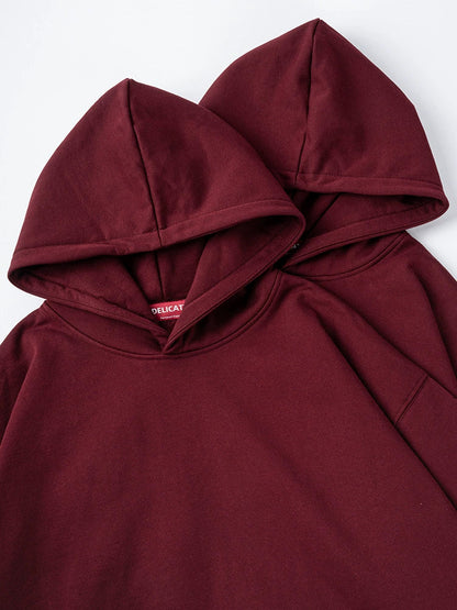 26 Solid color fleece-lined hooded sweatshirt