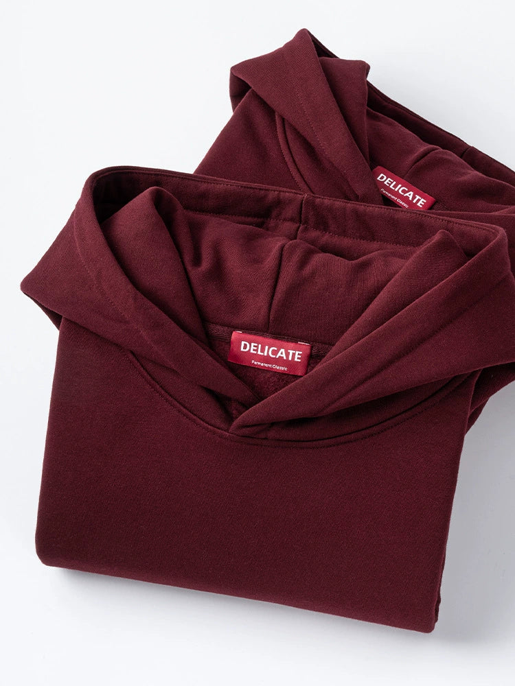 26 Solid color fleece-lined hooded sweatshirt