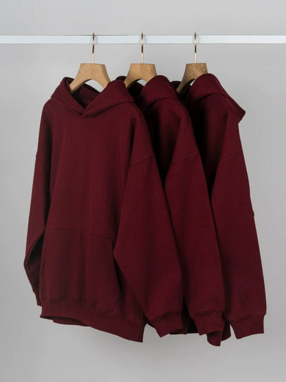 26 Solid color fleece-lined hooded sweatshirt